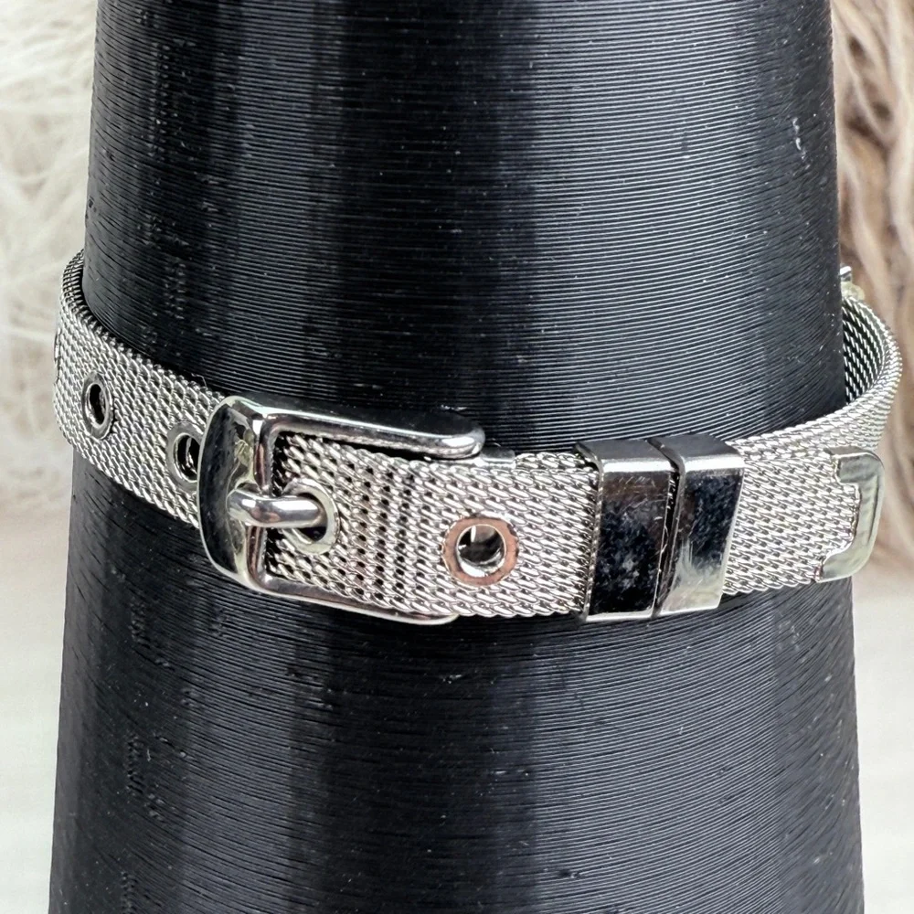 Silvertone Mesh Snap Bracelet with Blue Cross Design